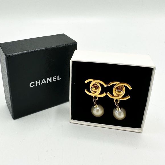 CHANEL Jewelry - Chanel Turnlock Pearl Dangling Clip-On